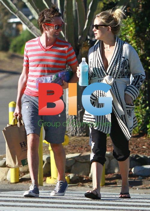 Kate Hudson and Matthew Bellamy at market