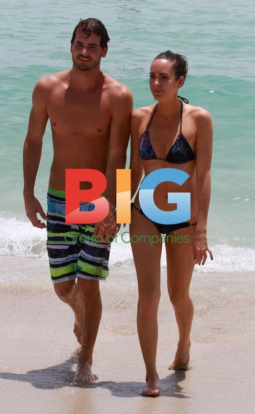 Louise Roe and Josh Slack at the beach