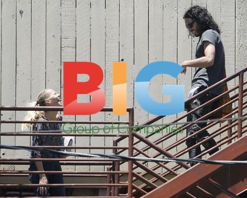 Russell Brand peekaboo moment with friend