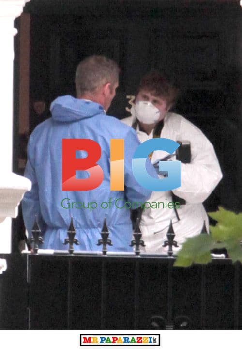 Photographers and Fans Gather at Amy Winehouse's Home