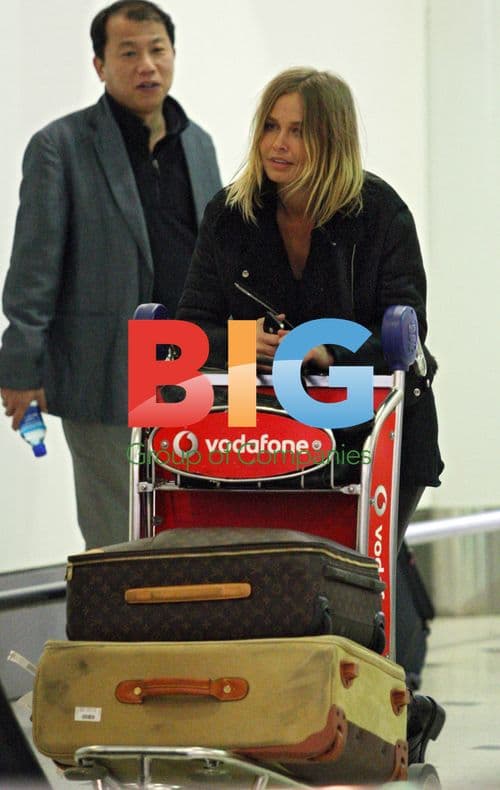 Lara Bingle Arrives in Sydney