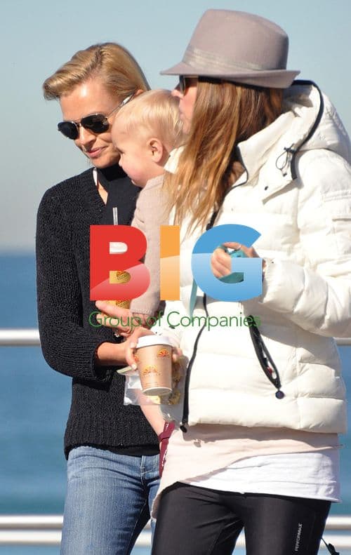Sarah Murdoch with Daughter Aerin on Bondi Beach
