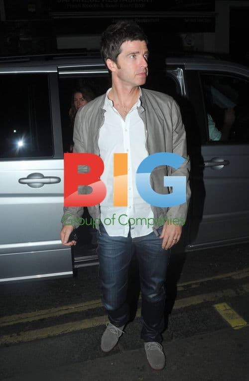 Noel Gallagher and wife Sara at London club