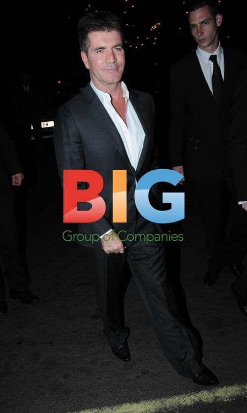 Simon Cowell Embraces Celebrity Hugger Tania McIntosh