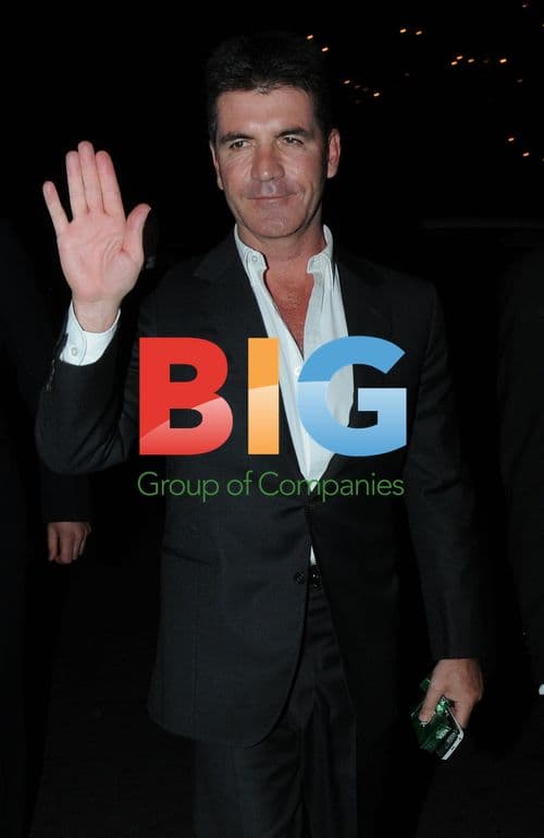 Simon Cowell Receives Hug