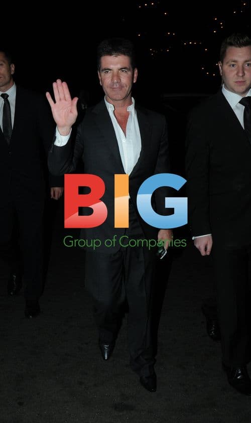 Simon Cowell Hugged in London