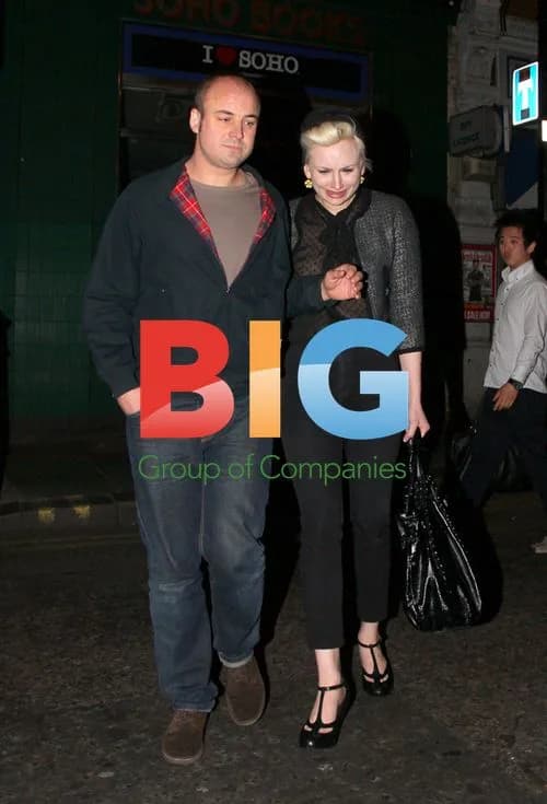 Director Reg Travis spotted with mystery blonde in Soho