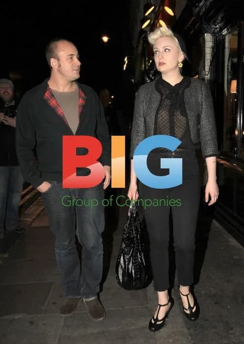 Amy Winehouse's ex-Director Reg Travis spotted with mystery blonde