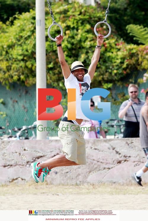 Ashley Cole Spends Summer with Mystery Woman