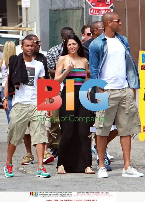 Ashley Cole on Summer Break with Mystery Woman
