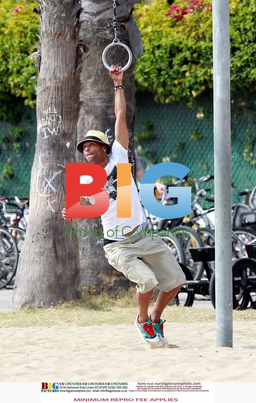 Ashley Cole Enjoys Bike Ride With Mystery Woman