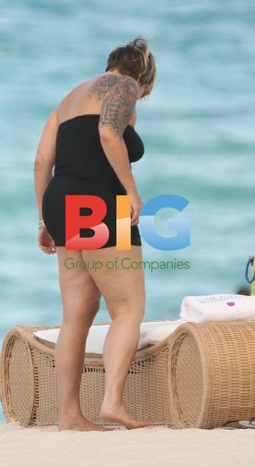 Mia Michaels in Swimsuit at Miami Beach