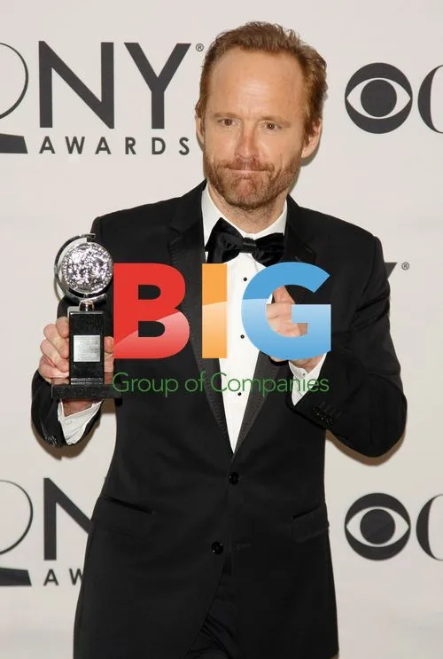 John Benjamin Hickey Poses After Tony Win