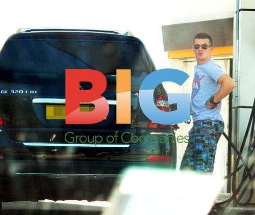 Joey Barton shopping and filling up with petrol in Portugal