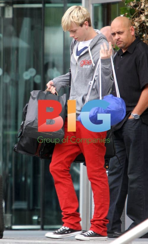 Glee cast departs hotel for UK tour