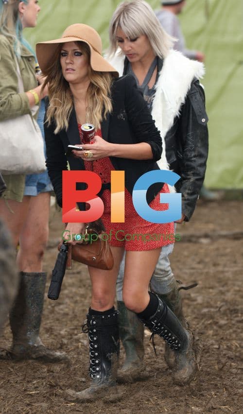 Caroline Flack and Laura Whitmore at Glastonbury 2011