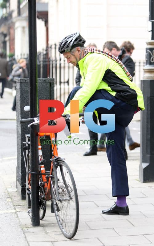 John Snow Riding Bike in London