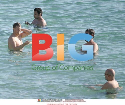 Michael Buble and Luisana Lopilato at the Beach