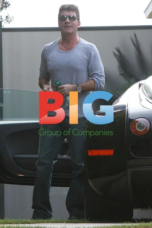Simon Cowell Driving Bugatti Veyron