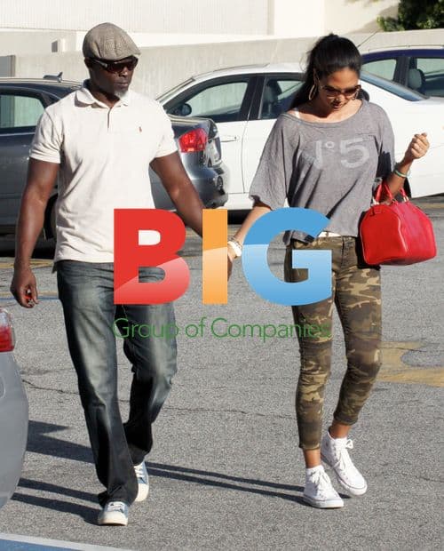 Kimora Lee Simmons and Djimon Hounsou at Rite Aid