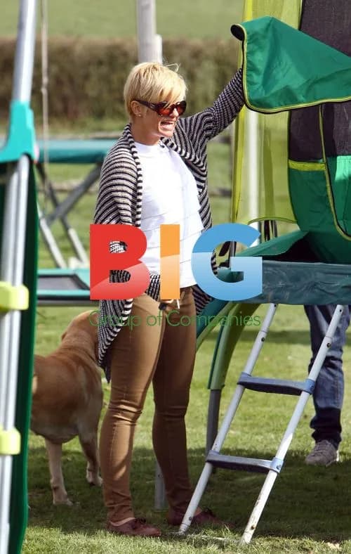 Kerry Katona chooses outdoor toys with son