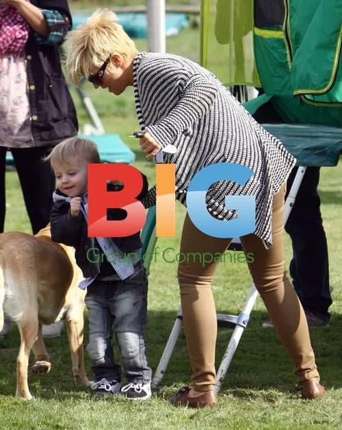 Kerry Katona chooses outdoor toys with son