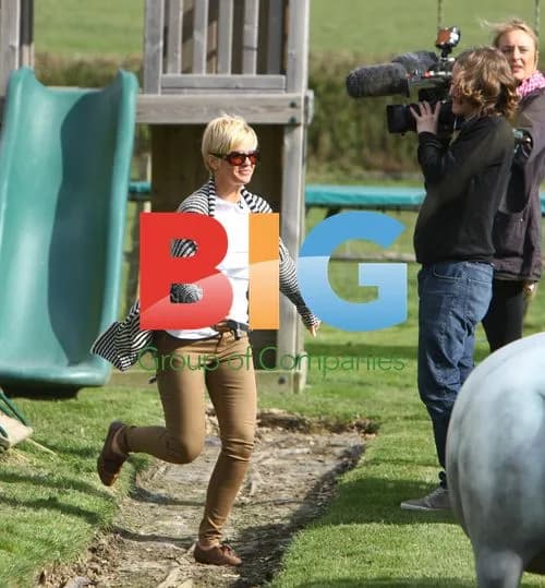 Kerry Katona chooses outdoor toys with son