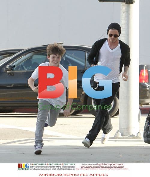 David Beckham and Brooklyn Shop at Saks