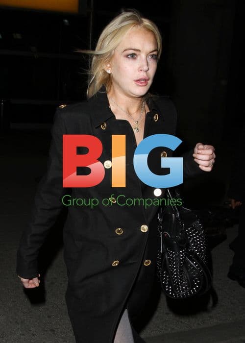 Lindsay Lohan Arrives at JFK Airport