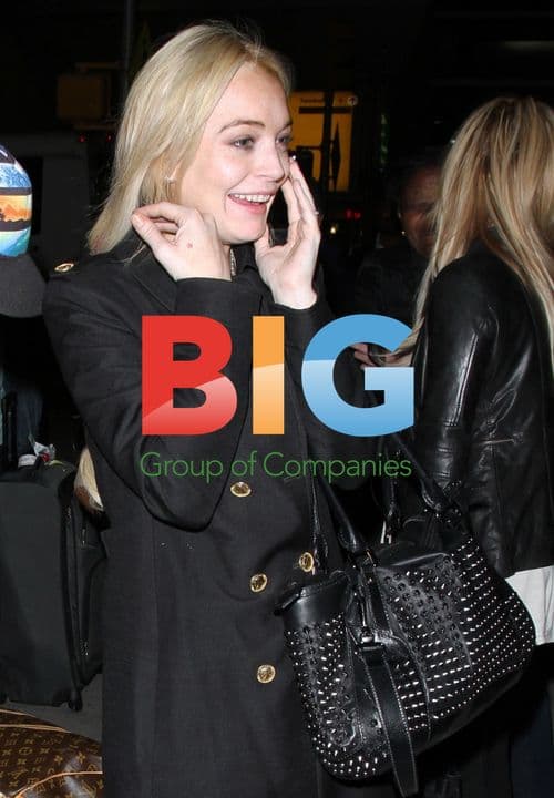 Lindsay Lohan Arrives at JFK