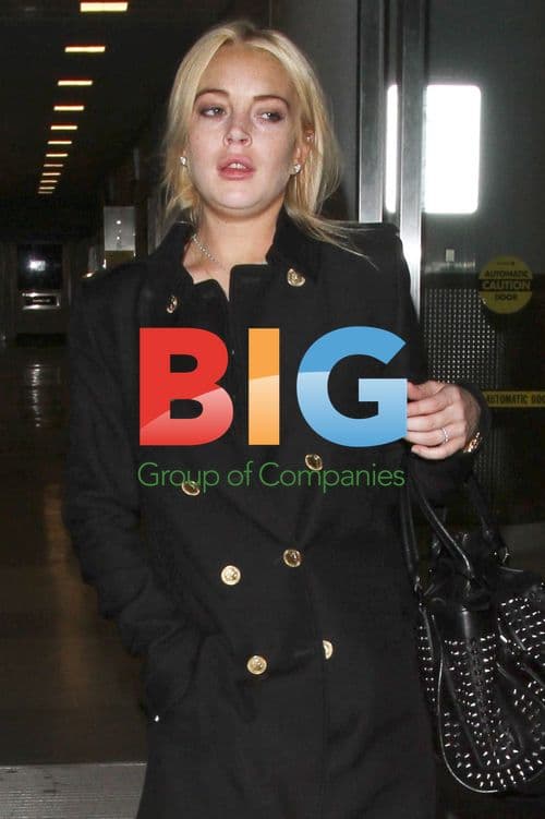 Lindsay Lohan Arrives at JFK