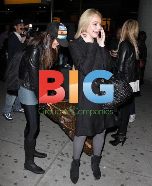 Lindsay Lohan Arrives at JFK