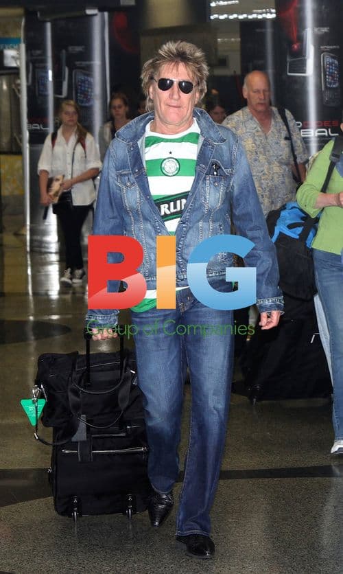 Rod Stewart arrives at Miami airport with family