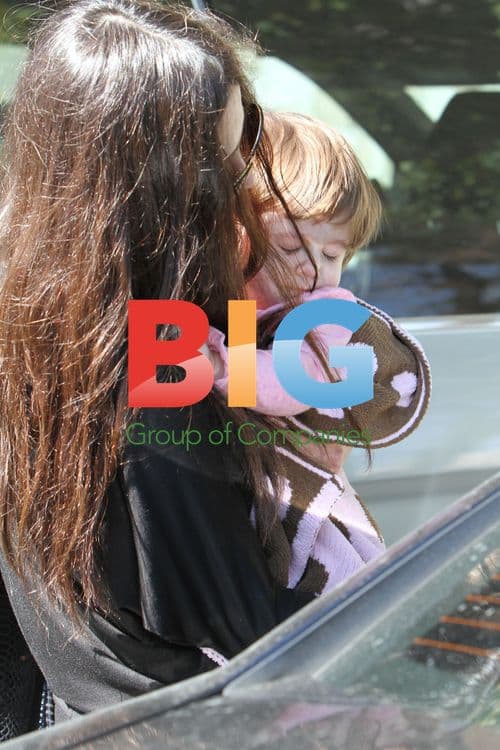 Oksana Carrying Daughter Lucia