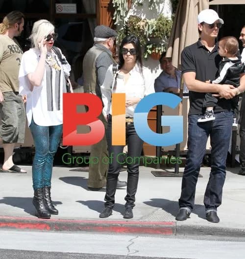Kourtney Kardashian with son and husband