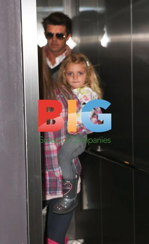Katie Price and Leandro Penna leave X Factor event