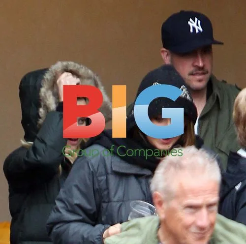 Reese Witherspoon Heads to Church in Rain