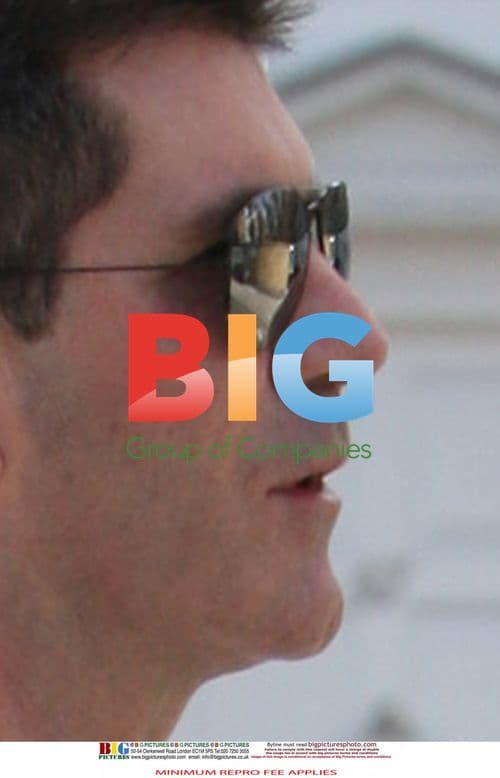 Simon Cowell out in London