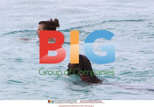 Coleen Rooney Relaxes with Friends in Caribbean