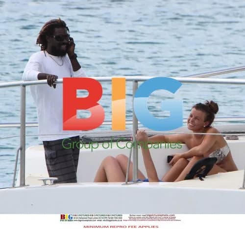 Coleen Rooney relaxes with friends in the Caribbean