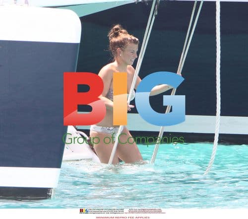 Coleen Rooney Chills in the Caribbean