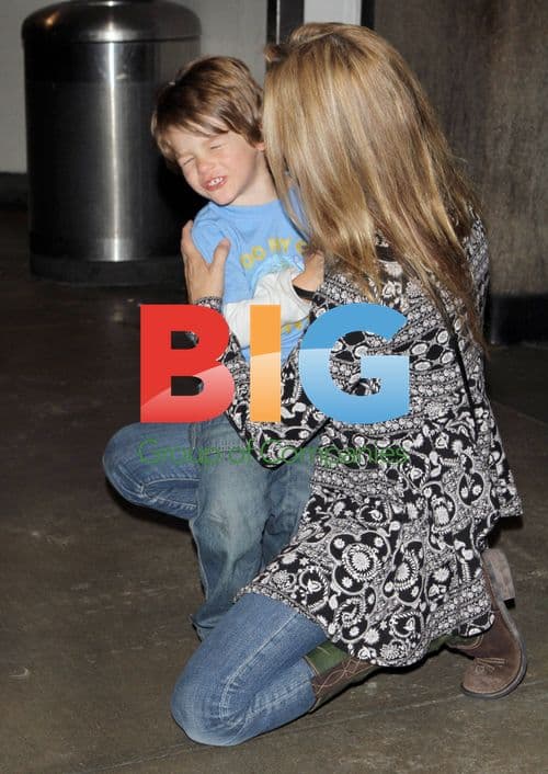 Sheryl Crow and Son Levi Arrive at LAX