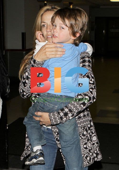 Sheryl Crow and son Levi at LAX