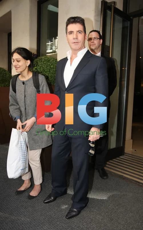 Simon Cowell Hugged by Tania McIntosh