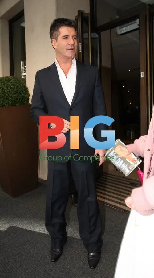 Simon Cowell Hugged at London Hotel