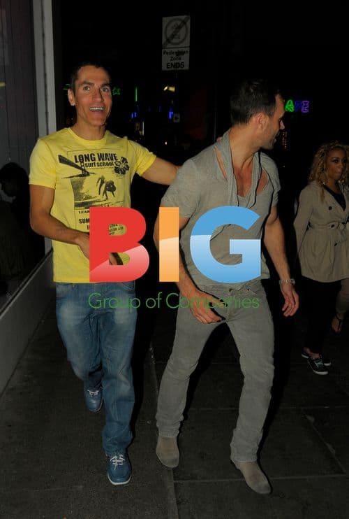 Jason Gardener walking with pal in Soho