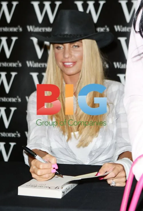 Katie Price and Leandro Penna at Book Signing