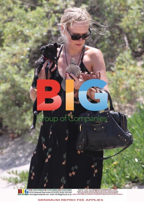 Kimberly Stewart Enjoys Beach Day with Family