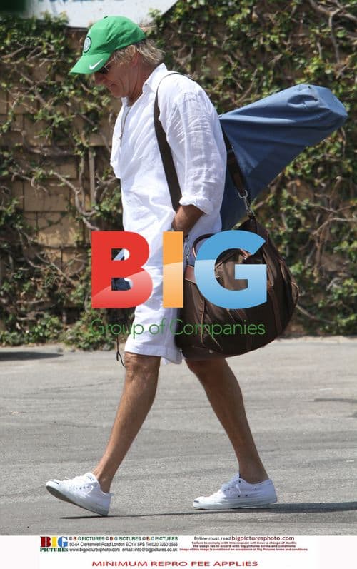 Kimberly Stewart Enjoys Beach Day with Rod Stewart