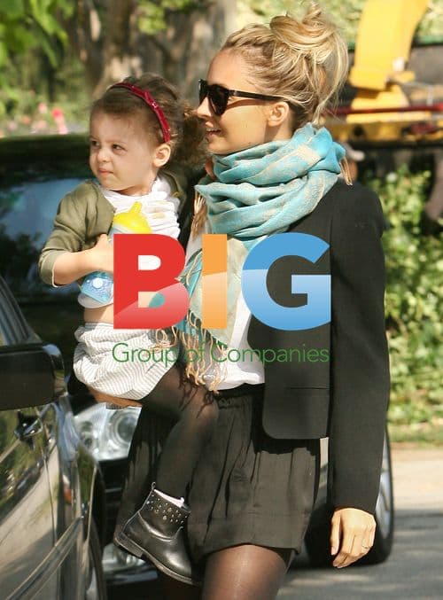 Nicole Richie with Kids at Party